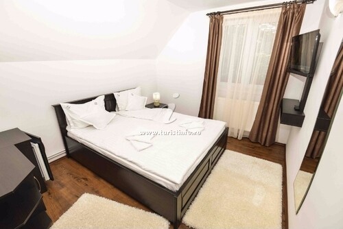 Camere de închiriat Casa Happy